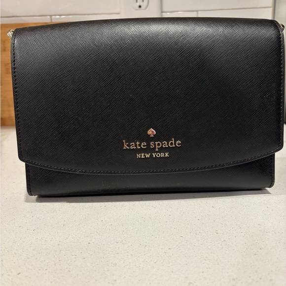 kate spade Handbags - Kate Spade Black Crossbody Bag with Gold Logo
